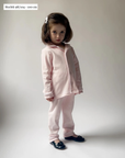 Långärmad pyjamas barn - rosa med vita detaljer