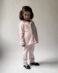Långärmad pyjamas barn - rosa med vita detaljer